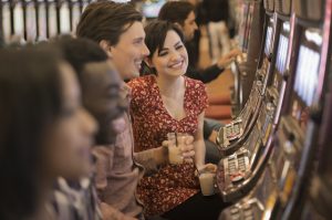 Tourists gambling at a casino.